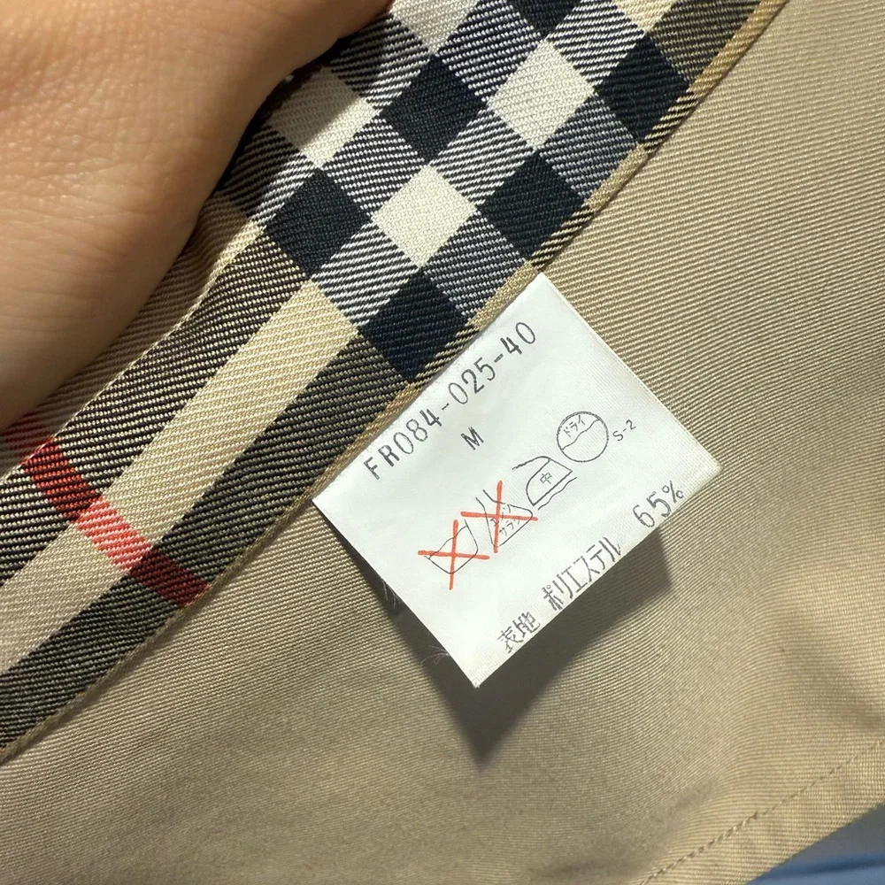 Burberry Tan Trench Coat. It's perfect. Too small for me. Marked M. Is really S. - Picture 7 of 7